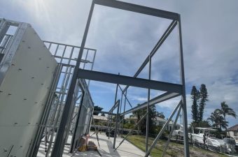 Steel frame construction under bright sun