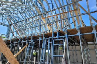 Steel framework and scaffolding for a building under construction.