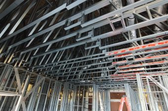 High ceiling metal truss and ductwork framing