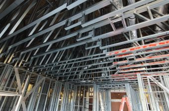 High ceiling metal truss and ductwork framing