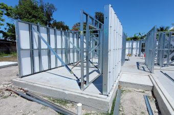 Steel framing and concrete panels for a building under construction.