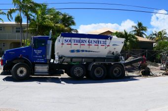 Concrete mixer truck parked outdoors with Southern Concrete branding.