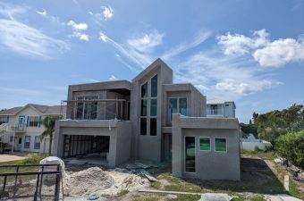 Contemporary stucco beach house mid-construction