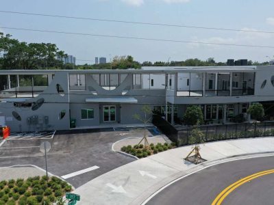 Modern residential complex with clean lines and landscaped surroundings.